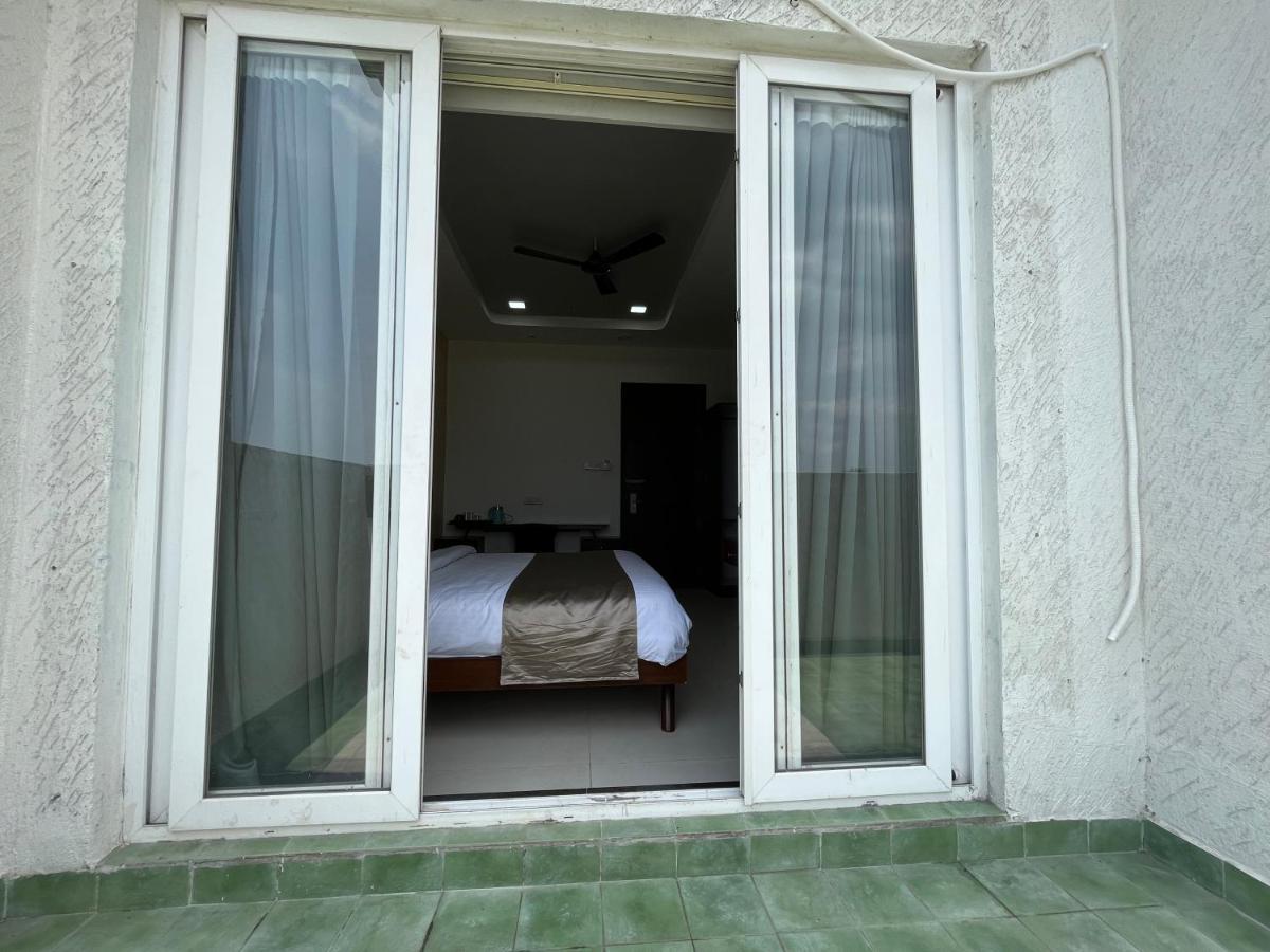 Getsethome Ponneri Bagian luar foto